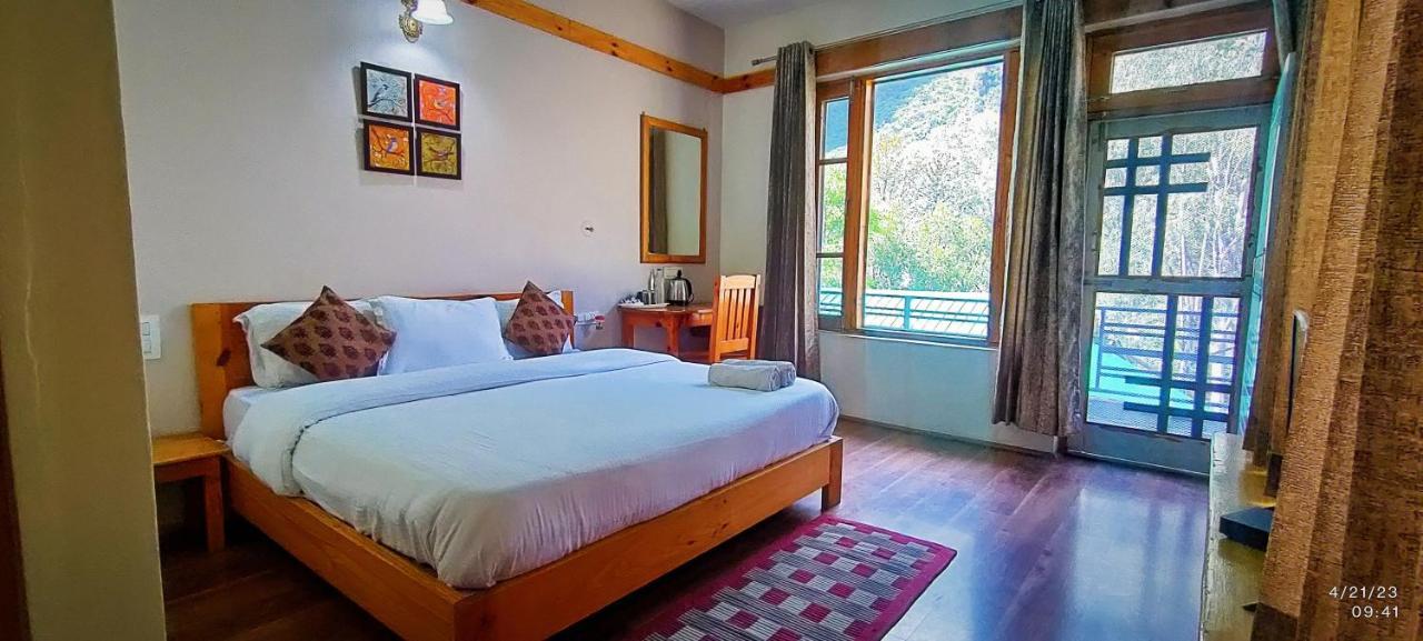 Tirthan Grand Riverside Banjār Esterno foto