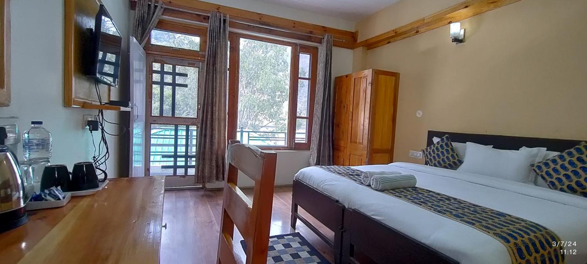 Tirthan Grand Riverside Banjār Esterno foto